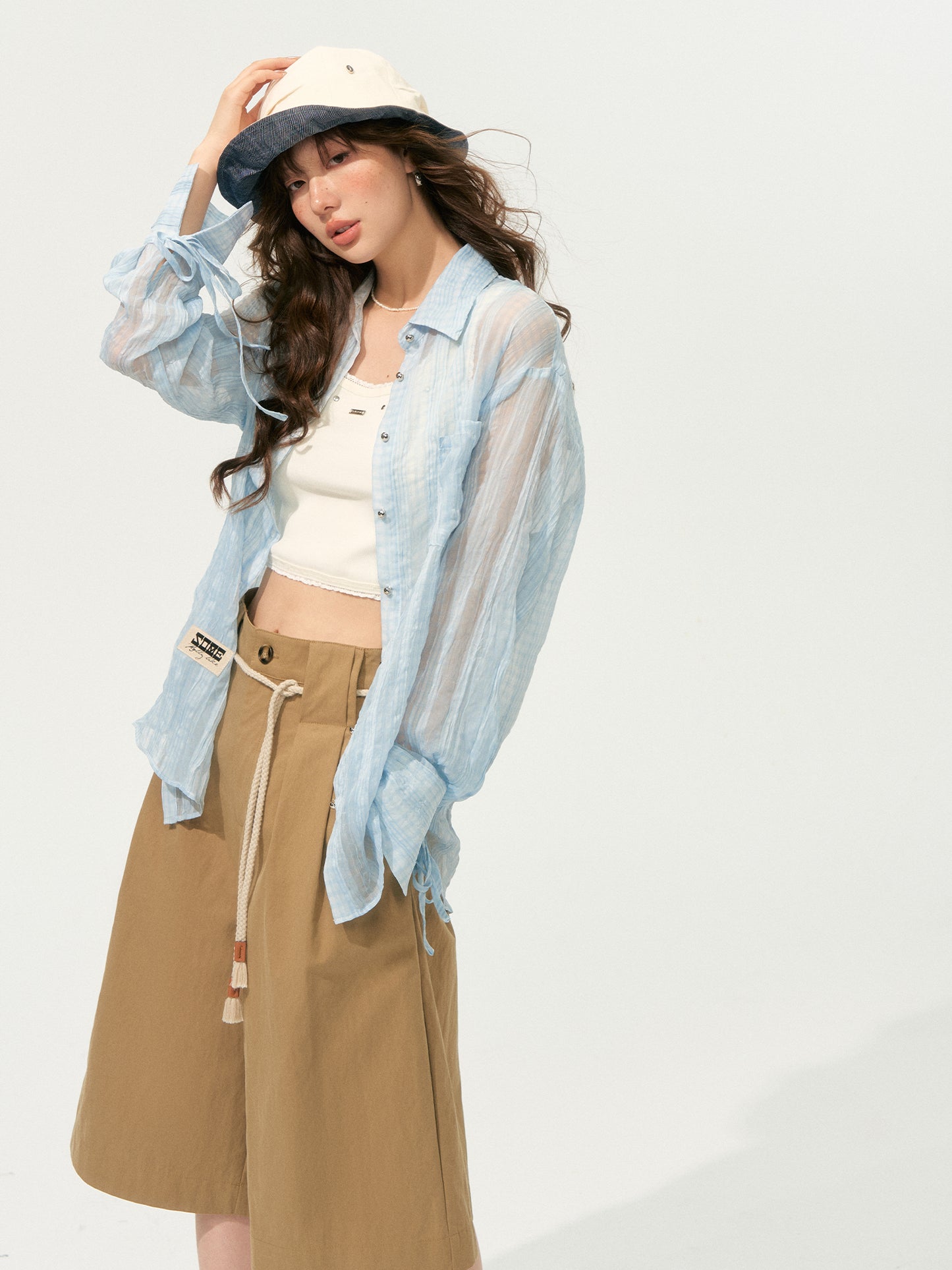 SOMESOWE Pleated Shorts & Sheer Blouse