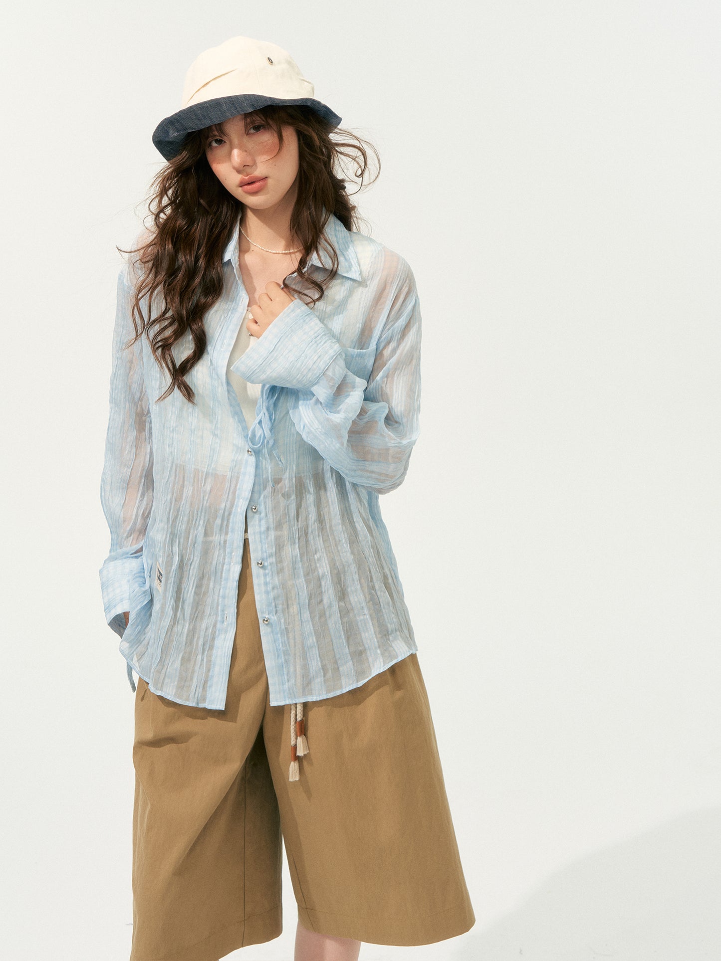 SOMESOWE Pleated Shorts & Sheer Blouse